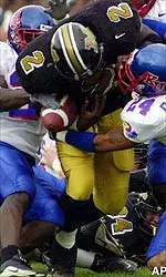 Zane Gilmore battles for some yardage during the loss to Kansas on Saturday.