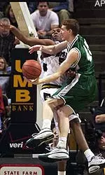 Arthur Johnson records one of his Missouri team single game record eight blocks against Stetson's Rickey McConnell in Saturday's 89-64 Tiger victory.