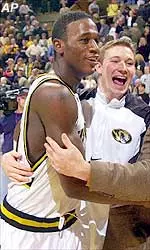 Kareem Rush is congratulated by a Tiger fan after Missouri's 77-73 victory over Saint Louis Saturday afternoon.
