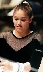 Shannon Brown scored 9.9 on bars at the Big 12 Championships.