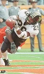 Missouri's Gary Anthony (29) takes the touchdown away from Clemson's Ronnie Thomas (85) as he tries to make the interception during the first half Saturday, Sept. 9, 2000, at Memorial Stadium in Clemson, S.C.(AP Photo/Patrick Collard)