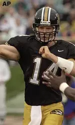 Kirk Farmer completes a pass in Missouri's loss to Iowa State Saturday.
