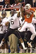 Missouri cornerback R.J. Jones defends against Oklahoma State reciever John Lewis during the first half of the game.