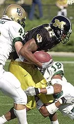 Justin Gage pulls down one of his 13 catches on his way to a school record 236 yards receiving.