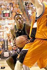 Kareem Rush enters the lane for a basket, during the Tigers 69-66 loss to Oklahoma State on Monday night.