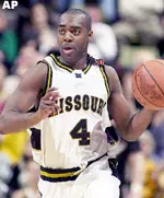 Tigers Clarence Gilbert pours in 19 points and hits 5-of-11 3-pointers against Kansas.