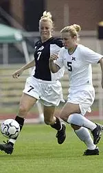 Forward Adriene Davis scores her third goal of the weekend against ranked opponents.