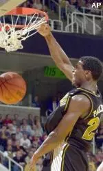 Rickey Paulding throws down a dunk during the second half of the NCAA West Region championship game Saturday.