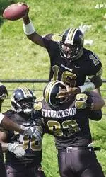 Freshman quarterback Brad Smith scored two touchdowns against Troy State.