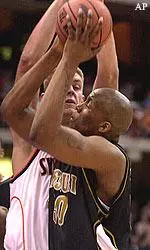 Missouri's Arthur Johnson goes up for a rebound against Syracuse's Craig Forth.