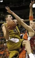 Linas Kleiza goes to the basket during the second half.