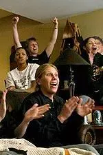 Head Coach Cindy Stein (background) and members of the women's basketball team celebrate the announcement that the Tigers made the 64-team NCAA Tournament bracket Sunday afternoon at Coach Stein's house.