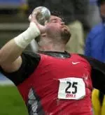 Tiger post-collegian Christian Cantwell throws the winning toss in the men's special shot put at the Drake Relays, Saturday, April 24, 2004, in Des Moines, Iowa. (AP Photo/Steve Pope)