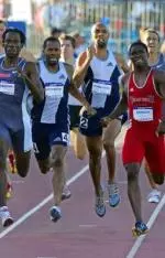 Khadevis Robinson, left, Derrick Peterson, and Jonathan Johnson, right, lead the men's 800 meter final during the Olympic Track and Field Trials in Sacramento, Calif., Monday, July 12, 2004. Johnson placed first, Robinson placed second and Peterson placed third. (AP Photo/David J. Phillip)