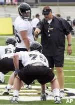 Mizzou Assistant Head Coach Dave Christensen puts his offensive linemen through drills