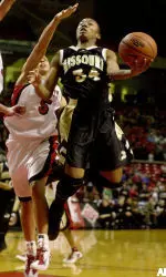 Tiffany Brooks goes up for a shot against Texas Tech's Chesley Dabbs during the first half.