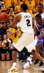 Jason Conley attempts to regain possession after the ball is knocked away by Kansas State's Fred Peete.