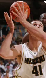 Linas Kleiza pulls down a board in the first half of Tuesday's opening-round NIT contest.