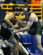 Matt Pell one a dramating 7-6 decision to advance in the championship bracket.