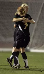Kristin Andrighetto and Meghan Pfeiffer celebrate the Tigers' second goal