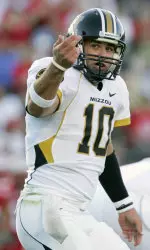 Chase Daniel gestures to a teammate to get into position at the line of scrimmage.