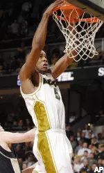Leo Lyons dunks the ball over Purdue's Robbie Hummel. Lyons had a team-high 13 points in the game. (AP Photo/L.G. Patterson)