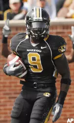 Missouri receiver Jeremy Maclin holds the football after scoring on a 24-yard reception Saturday. (AP Photo/L.G. Patterson)