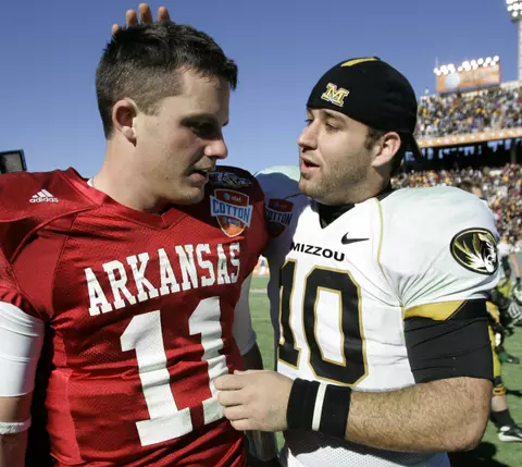 Missouri quarterback Chase Daniel talks with Arkansas quarterback Casey Dick after Missouri beat Arkansas 38-7 in the Cotton Bowl. (AP Photo/Tony Gutierrez)