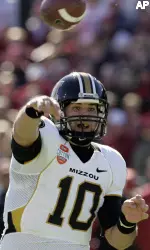 Missouri quarterback Chase Daniel releases a pass against Arkansas in the third quarter of the Cotton Bowl. (AP Photo/Tony Gutierrez)