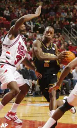 Keon Lawrence drives the lane during the second half.