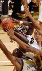 DeMarre Carroll shoots a basket over Prairie View A&M defenders in an 86-65 win.