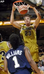 Missouri's Justin Safford, right, scores during the second half. (AP Photo/L.G. Patterson)