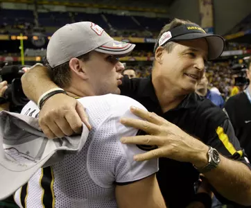 Missouri coach Gary Pinkel, right, celebrates with quarterback Chase Daniel, left, after they defeated Northwestern in the Alamo Bowl NCAA college football game in San Antonio, Monday, Dec. 29, 2008.