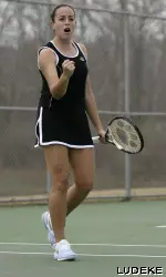 Tiger junior Sofia Ayala celebrates after winning a point in doubles action Friday afternoon. She and partner Kaitlin Dunham won the No. 2 doubles match, helping the Tigers win the doubles point.