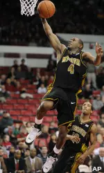 J.T. Tiller added 11 points for the Tigers.