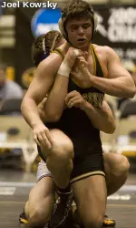 Missouri senior John Andrews held off his opponent at 184 pounds.