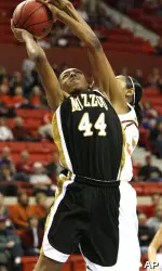 Shakara Jones goes up for a basket against Texas during the first half. (AP Photo/Alonzo Adams)