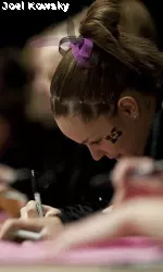 Sophomore Allie Heizelman signs autographs after last year's Pink Out meet