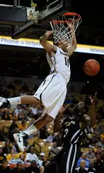 Mike Dixon and the Tigers finish exhibition play on Friday.