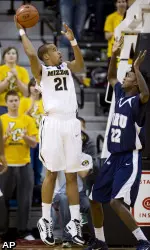 Missouri's Laurence Bowers shoots over Oral Roberts' Steven Roundtree.