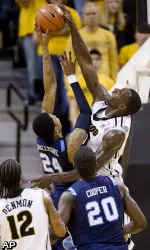 Missouri's Ricardo Ratliffe blocks the shot of Old Dominion's Kent Bazemore.