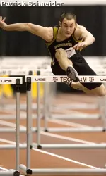 <i>Nick Adcock reset his own school record in the 60m hurdles.</i>