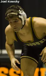 Senior Nicholas Marable claimed an 8-5 victory over Oklahoma's Tyler Caldwell.