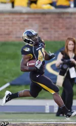Missouri running back Henry Josey scores a touchdown on a 62-yard run.