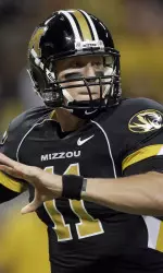 Missouri quarterback Blaine Gabbert drops back to pass during the first quarter. (AP Photo/Jeff Roberson)