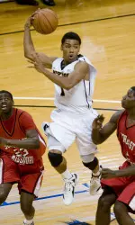 Missouri's Phil Pressey passes the ball