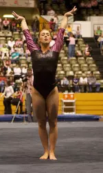 Ostad set a career-high on vault. She threw a front handspring pike half.