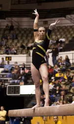 Alex Gold hit a high note at her last regular season home meet.