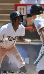 Shana White scored Mizzou's first run of the game on one of four OU errors.