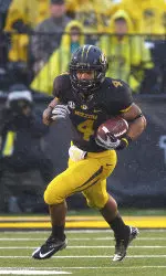 Kendial Lawrence scans the field.